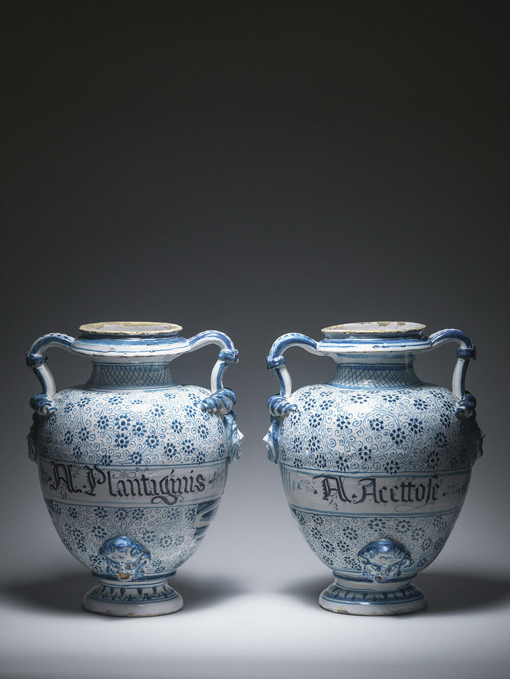 The Wick Culture - Two large pharmacy jars, stagnone, with spiral decoration inspired by ‘Golden Horn’ ware from Iznik, inscribed for Acqua Plantaginis and Acqua Acettose, Savona or Albissola, first half 17th century. Courtesy of Racanello & Leprince