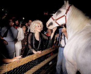 The Wick - Ron Galella, Dolly Parton and a white horse at Studio 54, 1978