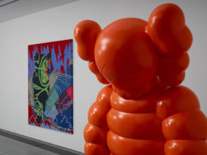 The Wick - KAWS: NEW FICTION at Serpentine. GETTING THE CALL (2018) and WHAT PARTY (2020). © Jonty Wilde (courtesy KAWS).