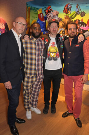 The Wick - LONDON, ENGLAND - MARCH 21: (L to R)  Dylan Jones, Tinie Tempah, Philip Colbert and Nima Sagharchi, Head of Digital Art, Bonhams, attend the launch of “The Lobstars (Genesis)” at Bonhams After Hours with a panel talk featuring British artist Philip Colbert, chart-topping musician and NFT collector Tinie Tempah, editor and author Dylan Jones and Bonhams Head of Digital Art at Bonhams Nima Sagharchi at Bonhams on March 21, 2022 in London, England. (Photo by David M. Benett/Dave Benett/Getty Images for Philip Colbert)