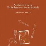 Brown cover of "Aesthetic Dining: The Art of Restaurants Around the World" by Christina Makris, highlighting global dining aesthetics.