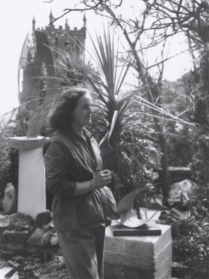 The Wick - Barbara Hepworth at Trewyn Studio, St Ives in 1957 with Stringed Figure (Curlew) [Version II] 1956 © Bowness 
