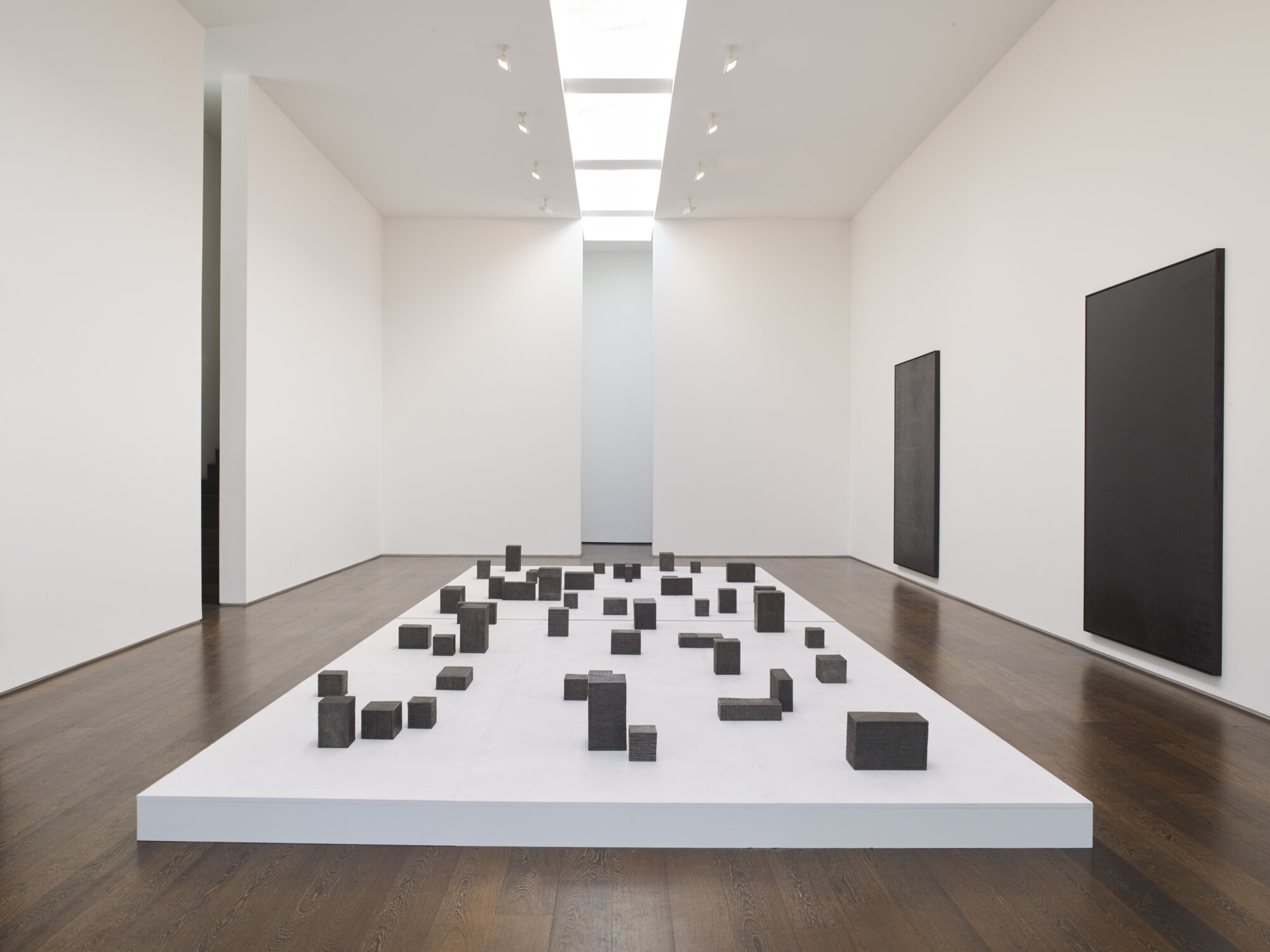 The Wick - Idris Khan, Absorbing Light, 2017 Series of 46 bronze blocks, Courtesy the artist and Victoria Miro, Photographer: Stephen White & Co., Installation view from Victoria Miro Gallery, 2017