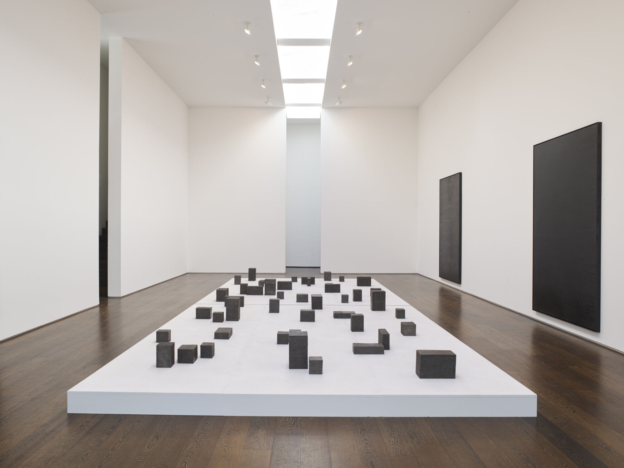 The Wick Culture - Idris Khan, Absorbing Light, 2017 Series of 46 bronze blocks, Courtesy the artist and Victoria Miro, Photographer: Stephen White & Co., Installation view from Victoria Miro Gallery, 2017