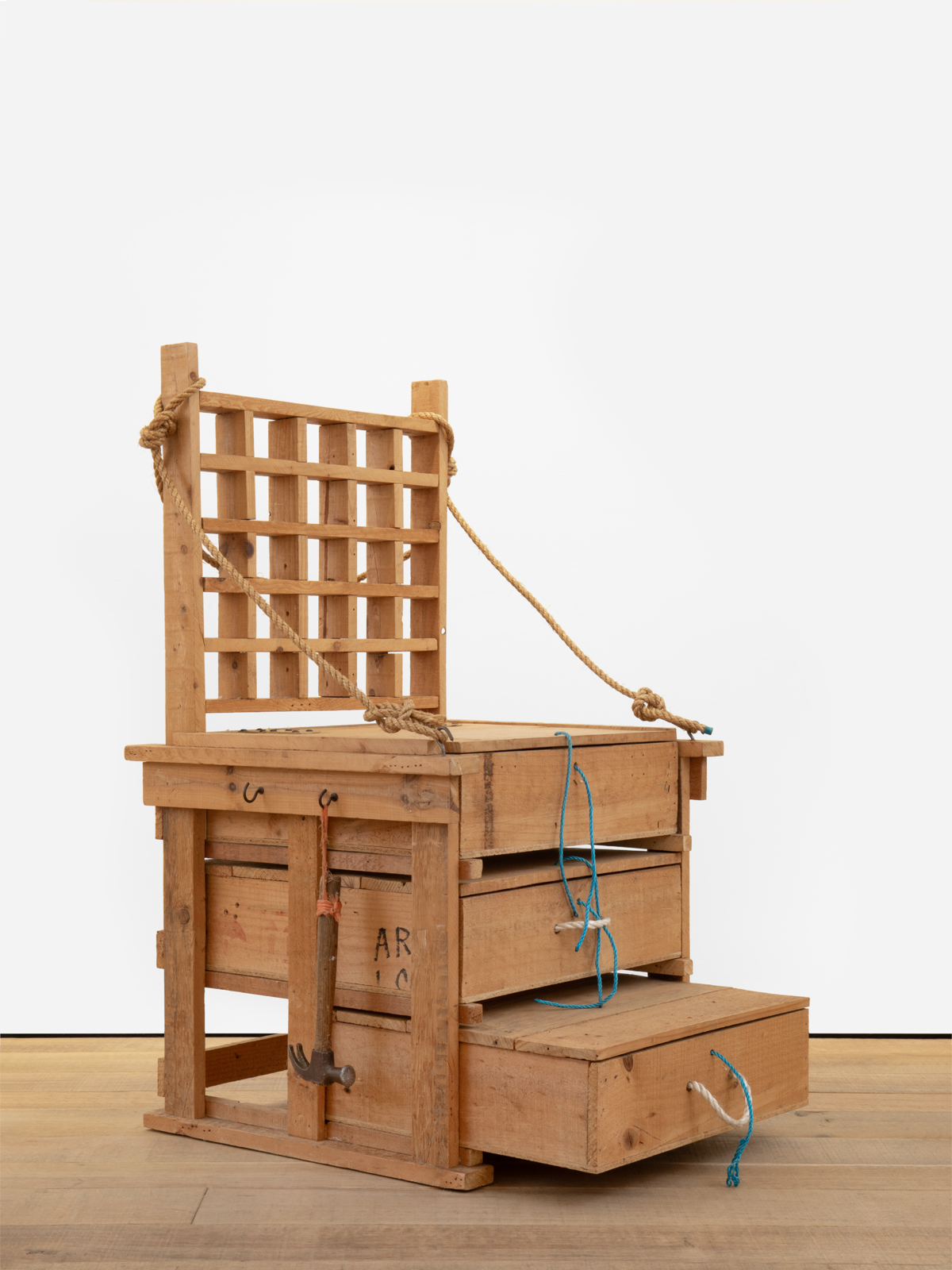 The Wick - Eduardo Paolozzi
Sculptor’s Chair, 1985-1987
salvaged and re-purposed materials including pine, beech, rope, linen, nylon cord, metal hooks and
nails, together with a hammer
unique
46.5 x 24.75 x 22.50 in (108 x 63 x 57 cm) © Eduardo Paolozzi, courtesy Simon Andrews and Sadie Coles HQ, London.Photo: Katie Morrison