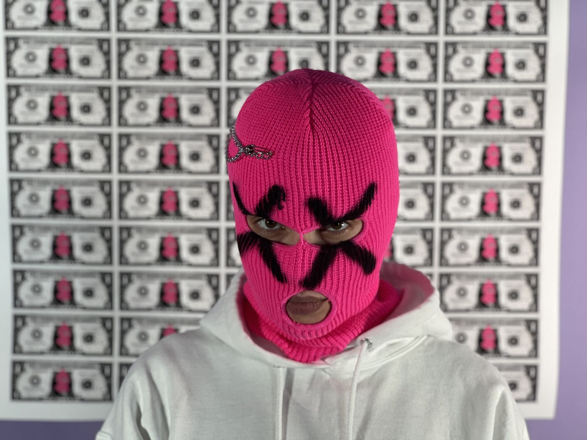 The Wick - Pussy Riot founder Nadya Tolokonnikova photographed standing in front of ‘50 One Dollar Bills‘ Los Angeles, May 2023 © Nadya Tolokonnikova, Courtesy CIRCA