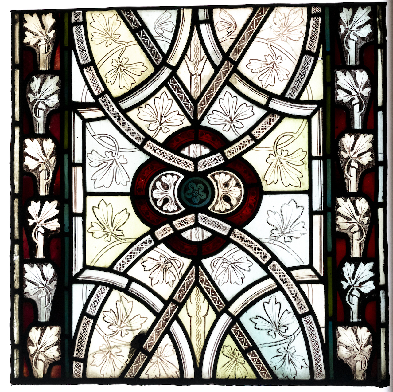 The Wick Culture - Philip Webb / Morris, Marshall, Faulkner & Co, Grisaille foliage vine scroll, 1865, stained glass panel. Courtesy of The Stained Glass Museum
