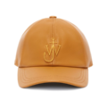 A tan leather baseball cap by JW Anderson with embroidered initials on the front.