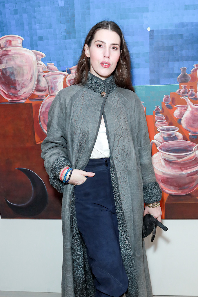 The Wick Culture - LONDON, ENGLAND - NOVEMBER 27: Lily Lewis attends the Sacred Land Exhibition at Saatchi Gallery on November 27, 2024 in London, England. (Photo by Dave Benett/Getty Images for Planethon-365)