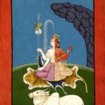 A traditional asian deity in red and white sitting on a hill with a white cow below
