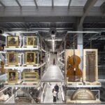 Inside of a warehouse with artworks on display