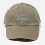 A green cap with 'collector' written in blue
