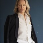 A woman wearing a suit