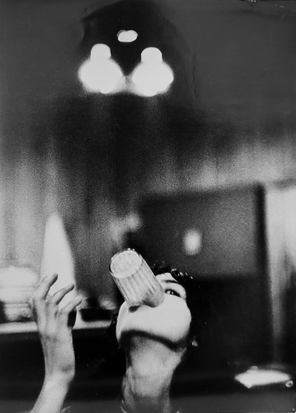 The Wick Culture - Louis Stettner Nancy Playing with a Glass, Nancy, the Beat Generation series, New York, 1958. Courtesy of the Louis Stettner Estate