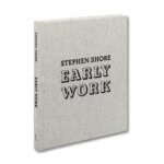 A grey book with black writing