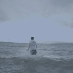 A man running in the sea
