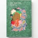 A book with a green cover with floral