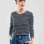 A woman wearing a striped top