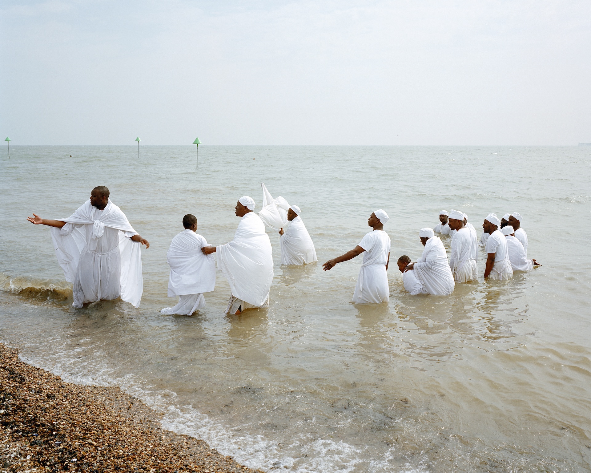 The Wick Culture - Chloe Dewe Mathews 32. Mass Baptism, from ‘Thames Log’, 2013 C-type print, dry mounted onto card © Chloe Dewe Mathews