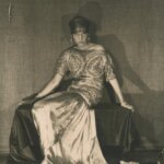 A photograph of a woman wearing a dress