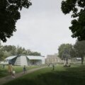 A park with buildings and people
