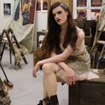 A person sitting in an art studio