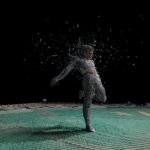 A photograph of a man in an abstract space