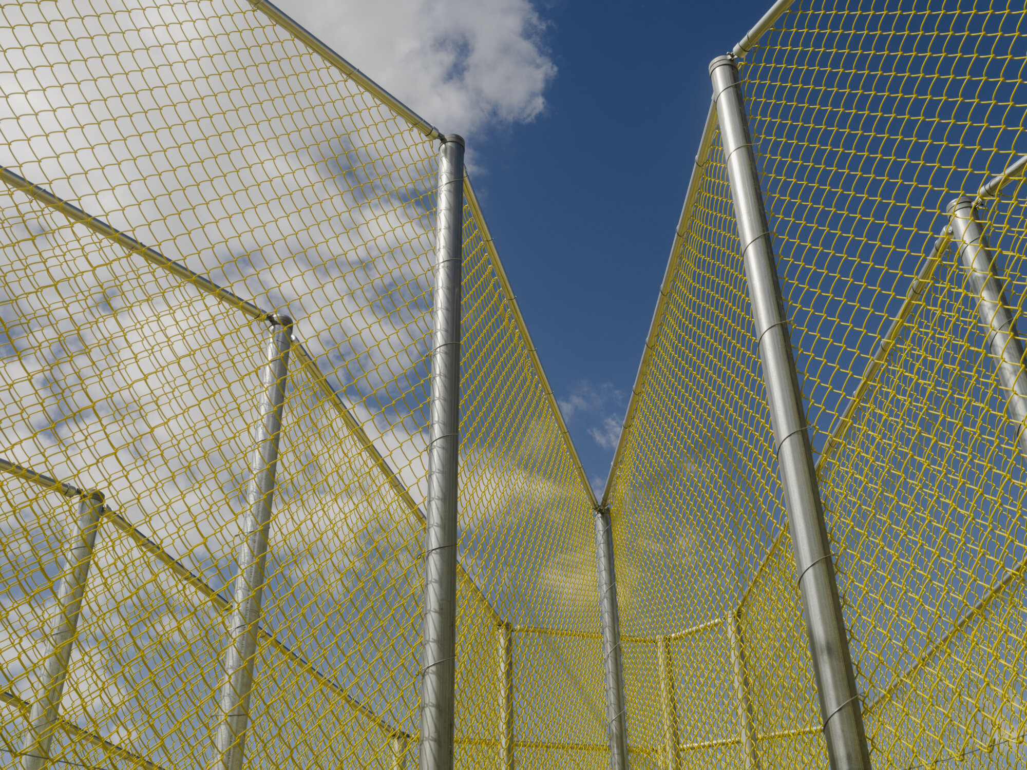 The Wick Culture - Above: 'No. 1225 Chainlink', 2023, vinyl coated steel chainlink. Installation view, Desert X, The Desert Biennial Palm Springs, USA. Photo: Lance Gerber. 