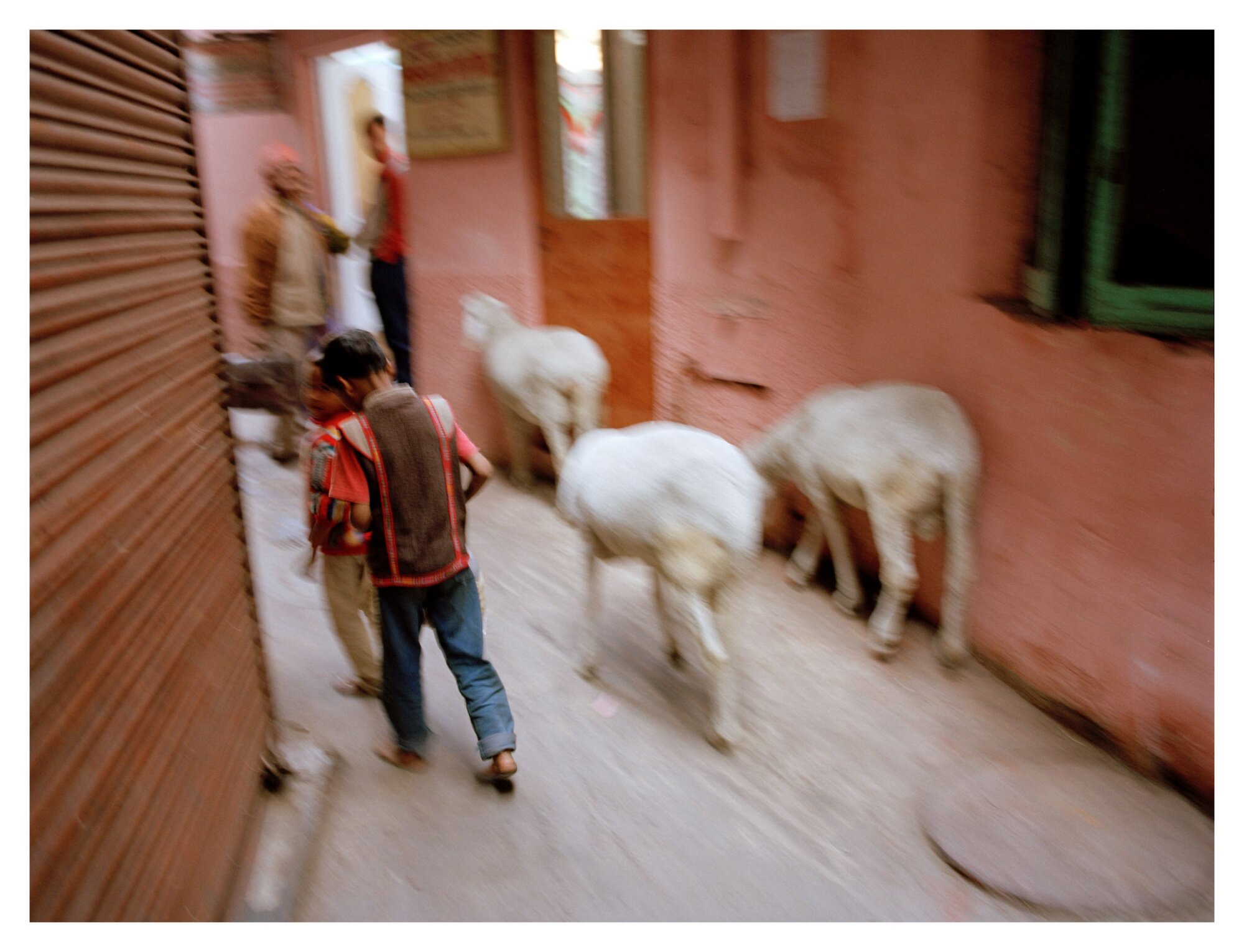 The Wick Culture - Sunil Gupta, Nizamuddin Lane (2004) from Tales of a City: Delhi (2004). Image courtesy the artist and Hales Gallery, Materià Gallery, SepiaEye, Stephen Bulger Gallery and Vadehra Art Gallery. © Sunil Gupta. All Rights Reserved, DACS 2025.
